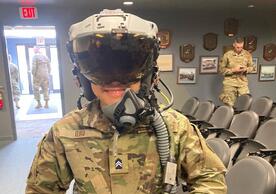 Cadet wears fighter pilot helmet